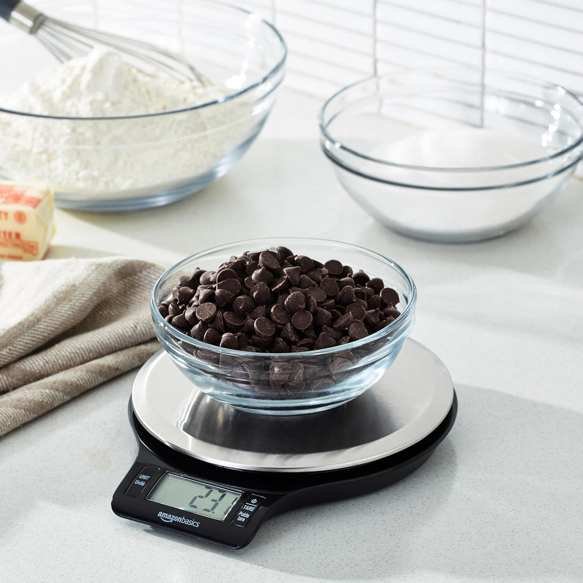 Amazon Basics Digital Kitchen Scale with LCD Display. Tare Function. Multiple Units. Weighs up to 11 Pounds. Batteries Included. Black and Stainless Steel