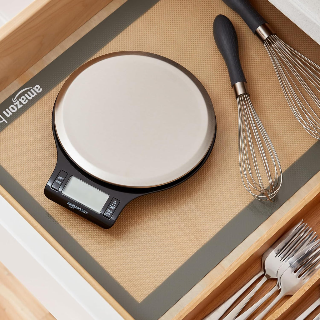 Amazon Basics Digital Kitchen Scale with LCD Display. Tare Function. Multiple Units. Weighs up to 11 Pounds. Batteries Included. Black and Stainless Steel